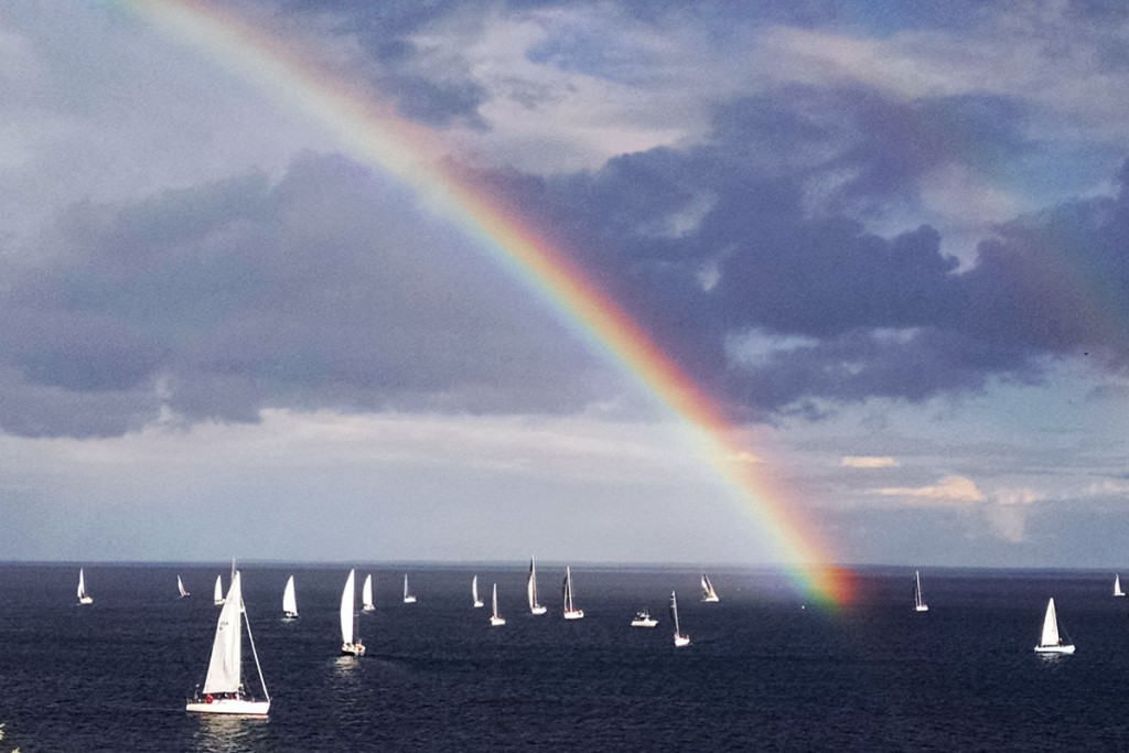 Lake Superior sailboat race under a rainbow