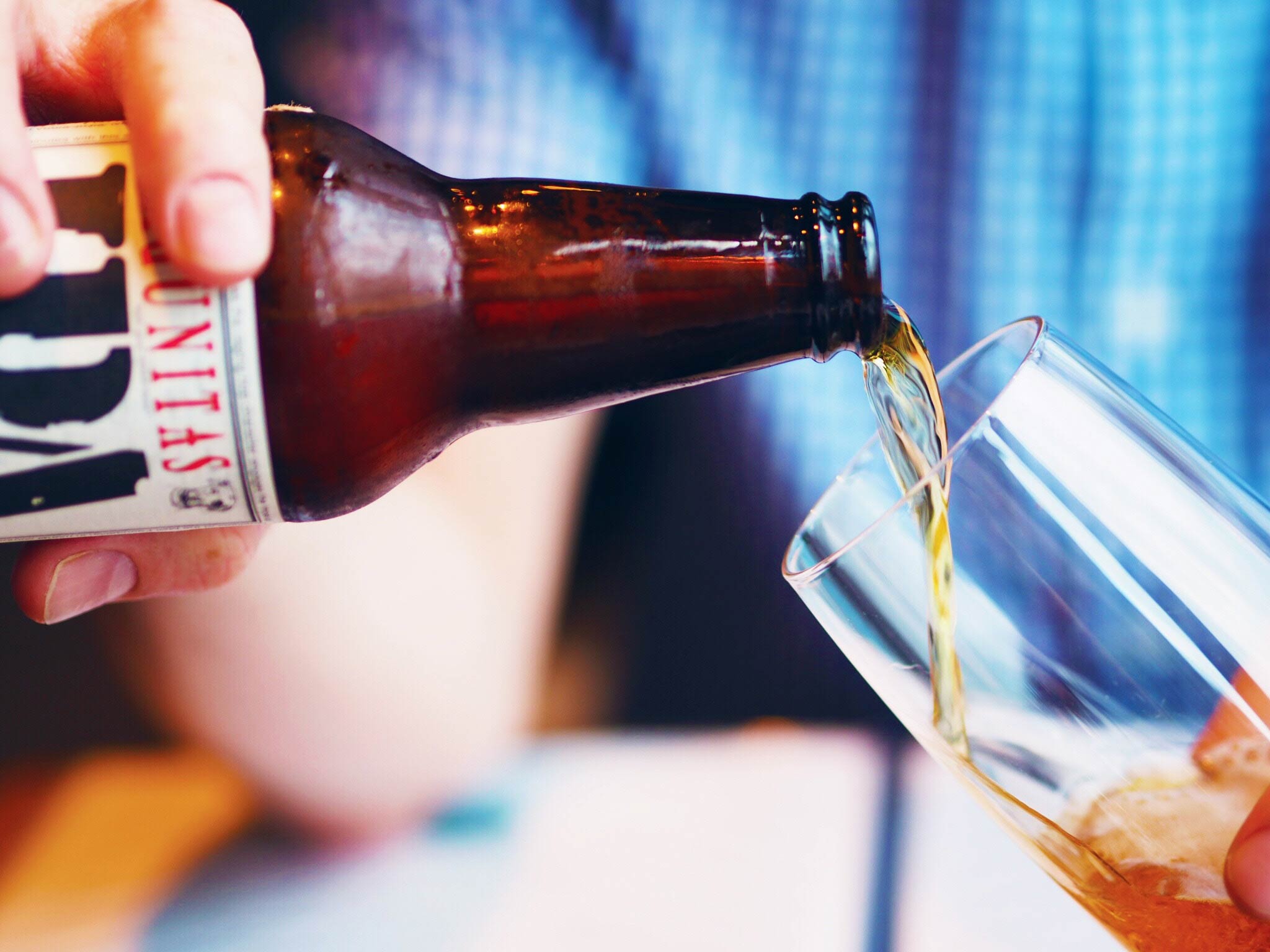 Beer being poured into a glass